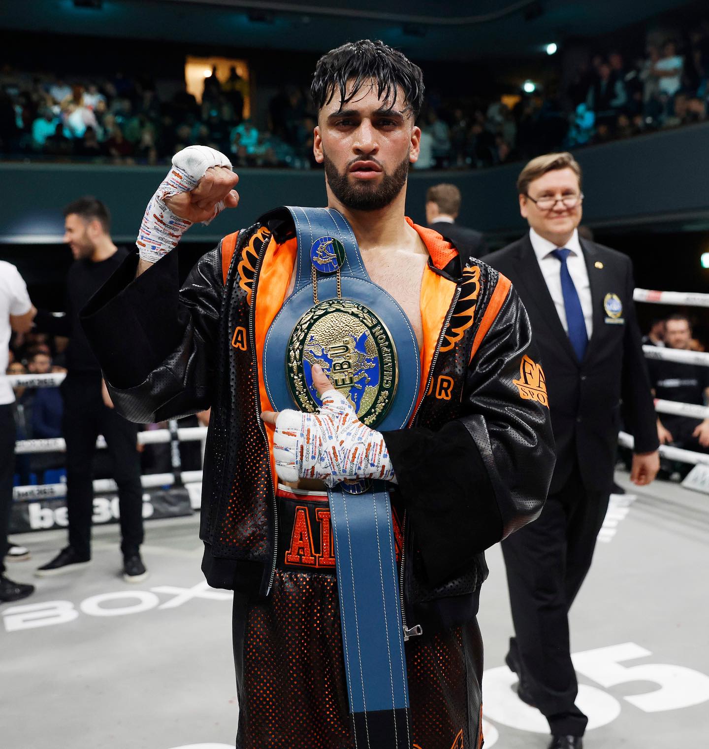 Azim stops Petitjean, wins EBU title