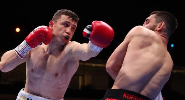 Madrimov stops Kurbanov, wins WBA super-...